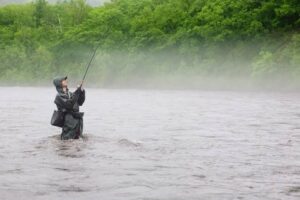 giant trout fishing in rain
